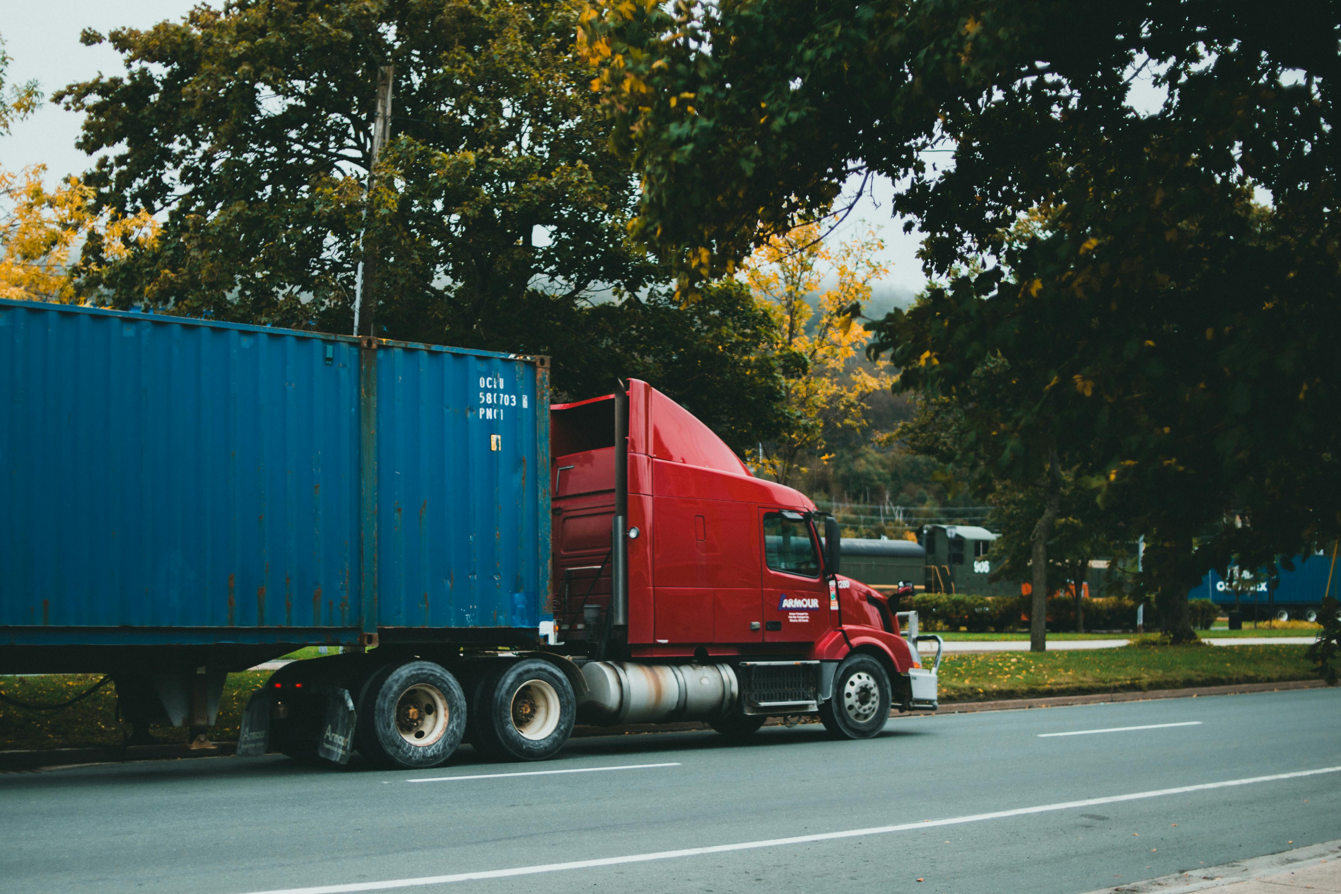 Professional truck driver handling cargo